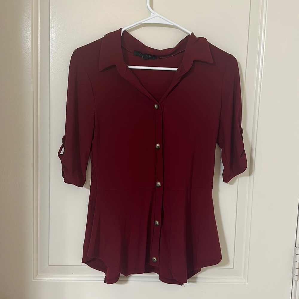 Stretchable blouse. Fair condition.